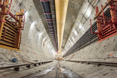 A March 2016 photo from the WSDOT looks north toward the back end of Bertha, the SR 99 tunneling machine. The steel hooks on both sides of the circular wall of the tunnel will become part of the foundation that will support the decks and walls of the future roadway inside the tunnel.