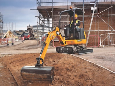 The JCB 8018 Contractor compact excavator comes standard with removable rubber street pads on the dozer blade.