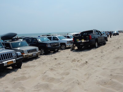 Critics of Truck Beach posted this photo on safebeach.org along with a caption which states, “Is this what you pay taxes for? To have our beaches trashed and blighted? Would you take your kids here?”