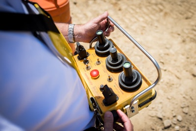 The D155AXi-8 RC’s radio control unit has a range of about 100 meters and allows for control of the ripper.