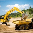 Komatsu’s new PC490LCi-11 loads up during a demo at the manufacturer’s Catersville, Ga., customer center. Photo credit: Wayne Grayson