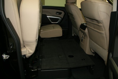 The double-hinged storage box lid folds flat across the rear floorboard which makes for better stacking.