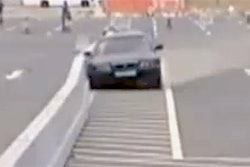 KOAA video shows a test of the steel barrier flexing with the impact of a car.