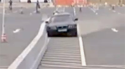 KOAA video shows a test of the steel barrier flexing with the impact of a car.