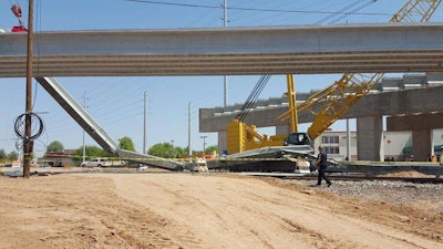 The collapsed girder, cracked in half on the left side of the frame, is seen in a photo from the Surprise Fire Department. Photo credit: @SurpriseFD on Twitter
