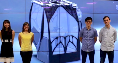 The UIUC design team stands in front for their cab rendering. Left to right: Sharon Tsubaki, Naomi Audet, Jowon Kim and Andrew Peterman. Not pictured: Luke Meyer.