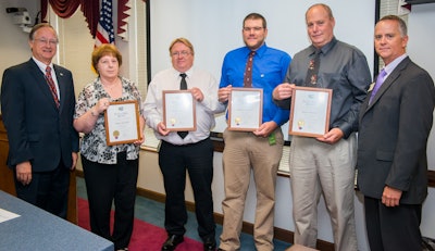 Pictured from left to right: Transportation Secretary Nick Tennyson with Extra Mile Award winners Teresa Skinner, David Griffies, Thomas Jernigan, Keith Hurdle, and Division 4 Engineer Tim Little. (North Carolina DOT)