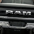 A 2016 Ram 1500 Laramie Limited Crew Cab 4×4 which is available with an electronic locking tailgate.