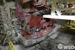 While Bertha’s cutter head digs deep below Seattle, her rear end places giant pieces of concrete to form the circular frame of the tunnel.