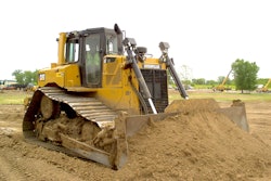 Student David Gomroth shows off his dozer operating skills. Gomroth is participating in a 6-week heavy equipment training program at Associated Training Services, Sun Prairie, Wis.