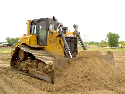 Student David Gomroth shows off his dozer operating skills. Gomroth is participating in a 6-week heavy equipment training program at Associated Training Services, Sun Prairie, Wis.