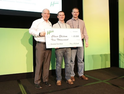 Last year’s winner: Chase Ekstam (center) receiving his check from Steve McGough, HCSS president and COO (left). They are joined by Doug Fronick (right) of APAC-Central, who supervised Chase during his internship.