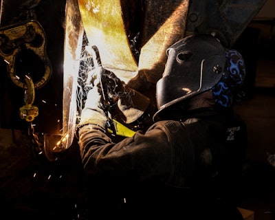Head mechanic Jason Peters performs a weld inside GMP’s equipment shop.