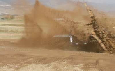 The 2017 F-250 FX4 plunges into a mud hole so deep that just the top of its cab can be seen.