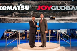 Komatsu president and CEO Tetsuji Ohashi, left, met with Joy Global president and CEO Ted Doheny, right, during the MINExpo show in Las Vegas this week. Komatsu’s acquisition of Joy is expected to close by mid-2017.