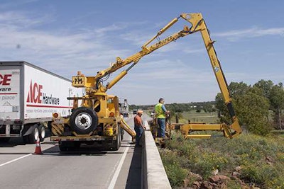 An ODOT crew uses a boom to inspect underneath a bridge in southwestern Oklahoma. Photo credit: ODOT