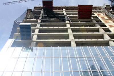 A lift operator was killed when his machine fell from the side of the BOK Plaza Tower in Oklahoma City last week. Photo Credit: Oklahoma City Fire Department Facebook page