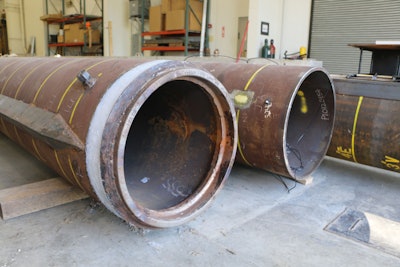 These open-ended pipe piles, about 100-feet long and two feet in diameter, will be used to test a type of bridge pile often seen in offshore applications, research that could help reduce the cost of bridge building or replacement of aging spans. Purdue University photo/Erin Easterling)