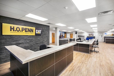 The new stone wall in the H.O. Penn reception area. (Photo: Ola Wilk/Wilk Marketing Communications)