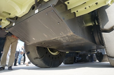 The LX1 driveline has no axles; instead electric drive motors are mounted at each wheel.