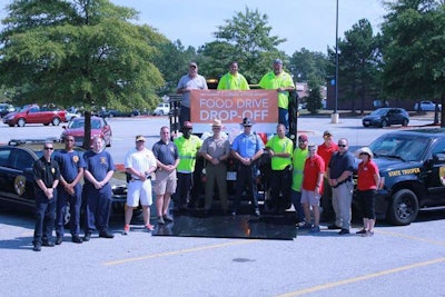 Maryland State Police and Department of Transportation employees came together to collect donations for the Maryland Food Bank in La Plata, Md., on September 10. Image: Maryland DOT