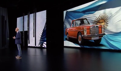 Dr. Dieter Zetsche, board chairman of Daimler AG and head of Mercedes-Benz Cars, talked about his fascination with pickups, including the short-lived Mercedes-Benz ‘La Pickup’ 220D shown on the screen behind him.