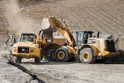 A Cat 972M loads a articulated hauler.
