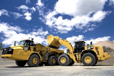 A Cat 982M loads a 735B articulated hauler.
