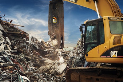 Cat’s new S3050 mobile shears in a scrap application.