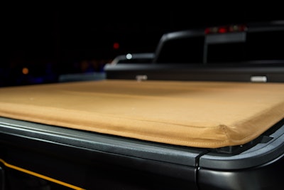 Not only does Carhartt’s duck brown fabric adorn the interior of this Silverado 2500HD, it forms the truck’s tonneau cover as well.