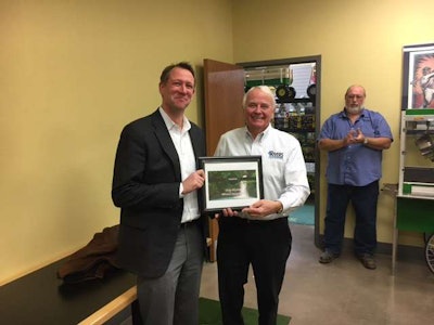 Presenting the award to 4 Rivers Equipment’s CEO Keith Olson, was Kevin Kruck, the John Deere Division/Regional Manager.