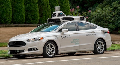 An autonomous sedan from Uber’s self-driving fleet in Pittsburgh, Pa.