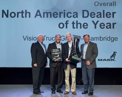 John Slotegraaf, president of Vision Truck Group (center right), accepts the Mack Trucks 2016 North American Dealer of the Year award from Dayle Wetherell, Mack regional vice president, Canada (left), Jonathan Randall, senior vice president of sales, Mack Trucks North America (center left), and Dennis Slagle, president, Mack Trucks (right).