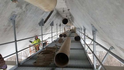 Installation of the drainage pipe continues. The drainage pipe will carry water runoff into Minn. where it will land in a holding pond and be filtered. (photo: Minnesota DOT)