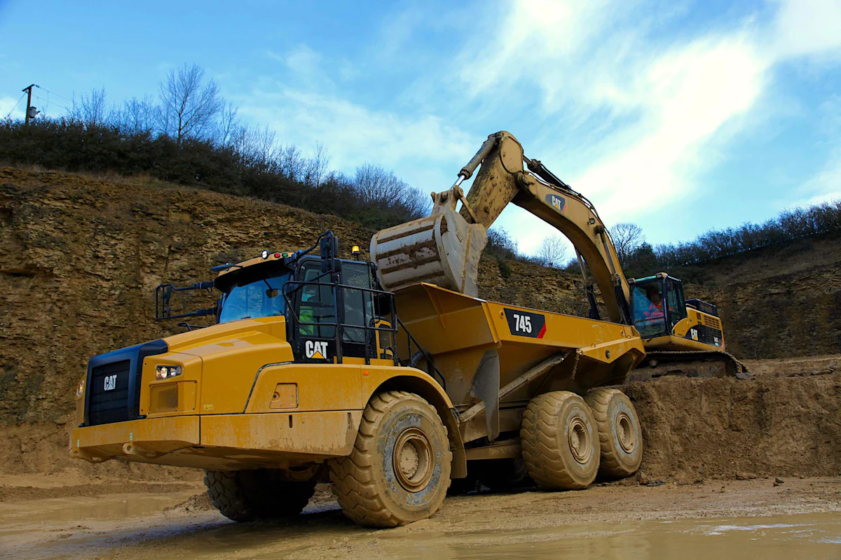 Cat unveils redesigned 745 articulated truck with larger cab, stability ...