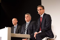 Caterpillar CEO Jim Umpleby (right) addresses the media during a ConExpo 2017 press conference. Photo credit: Wayne Grayson