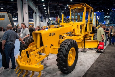 The star of Deere’s ConExpo 2017 booth was a restored JD570. Photos: Wayne Grayson