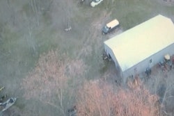 A still of CCSO drone footage from a report by FOX 45 TV. CCSO investigators found 19 pieces of stolen construction equipment on the property.