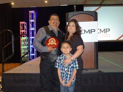 Lee Manzanares, RMCI General Contractors, 2017 AEMP Private Fleet Technician of the Year, with his wife Sharon and son Brandon.