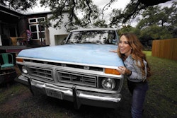 Kim Lewis of “Extreme Makeover: Home Edition” stands beside her 1977 Ford F-150 Ranger.