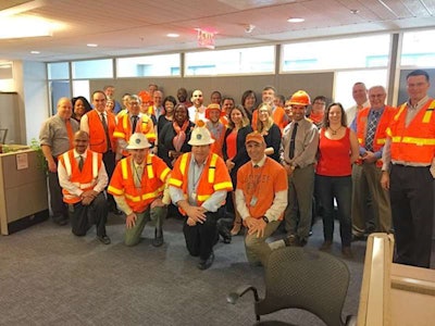 Employees at the Federal Highway Administration’s Office of Infrastructure wearing their colors for Go Orange Day.