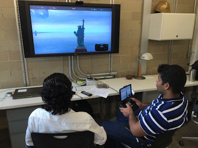 CONECTech students conduct a simulated drone flight. Photo: Ga. Tech