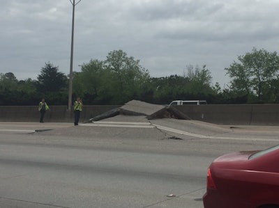 Pavement buckling upward caused a portion of I-20 West near Atlanta to be closed April 17. Photo: Tom Regan via Twitter