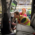 Facebook CEO Mark Zuckerberg helps to assemble an F-150 at the Ford Rouge Plant Thursday.