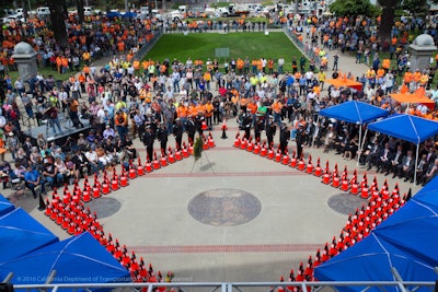 Each of the cones forming the 48-foot caution sign represent a Caltrans employee killed in the line of duty. This year the Caltrans Honor Guard added three cones to the caution sign in honor of Jorge Lopez, Ryan Whisenhunt and Annette Brooks. (Caltrans)