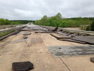 Asphalt portions of I-44 at Hazelgreen in Missouri peeled off after heavy flooding in the area. (Missouri DOT Central District)