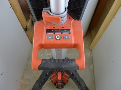 A control panel along with a convenient carrying handle is built into a platform at the midpoint on the mast.