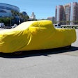Almost ready…the Workhorse W-15 electric pickup sits under wraps in the parking lot of the Long Beach Convention Center Monday. The reveal is scheduled for Tuesday night.