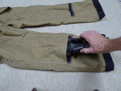 The knee pad inserts slip into pockets on the inside of the pants.