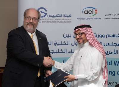 Ronald G. Burg, Executive Vice President of the American Concrete Institute, and Dr. Nabil bin Ameen Molla, Secretary General of the GCC Standardization Organization.